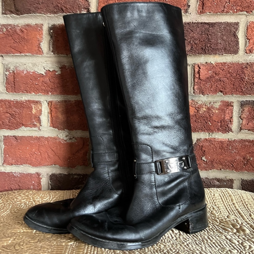 Black leather boots by Etienne Aigner with buckles